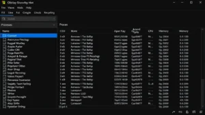 Windows 11 Task Manager interface showing Processes tab with multiple applications running, modern dark theme, detailed CPU and memory columns visible
